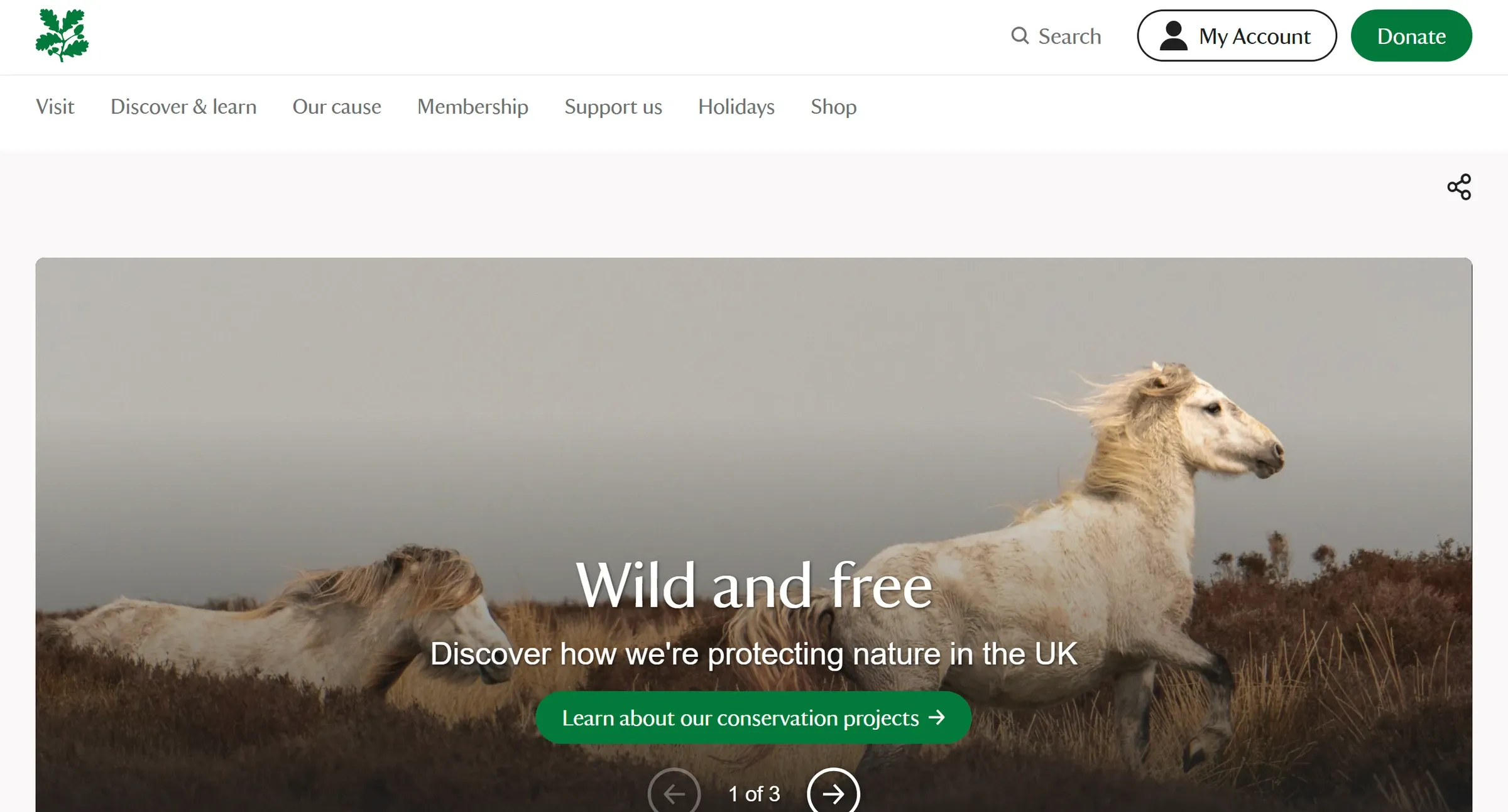 The National Trust homepage, a three-slide carousel under a nav that opens with Visit and carries Membership